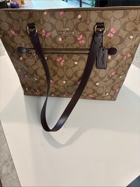 Coach Brown Signature Tote with Pink Butterfly Accents